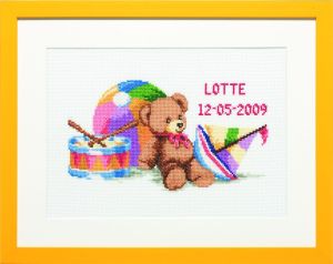 Embroidery kit birthday sampler teddy playing with toys.
